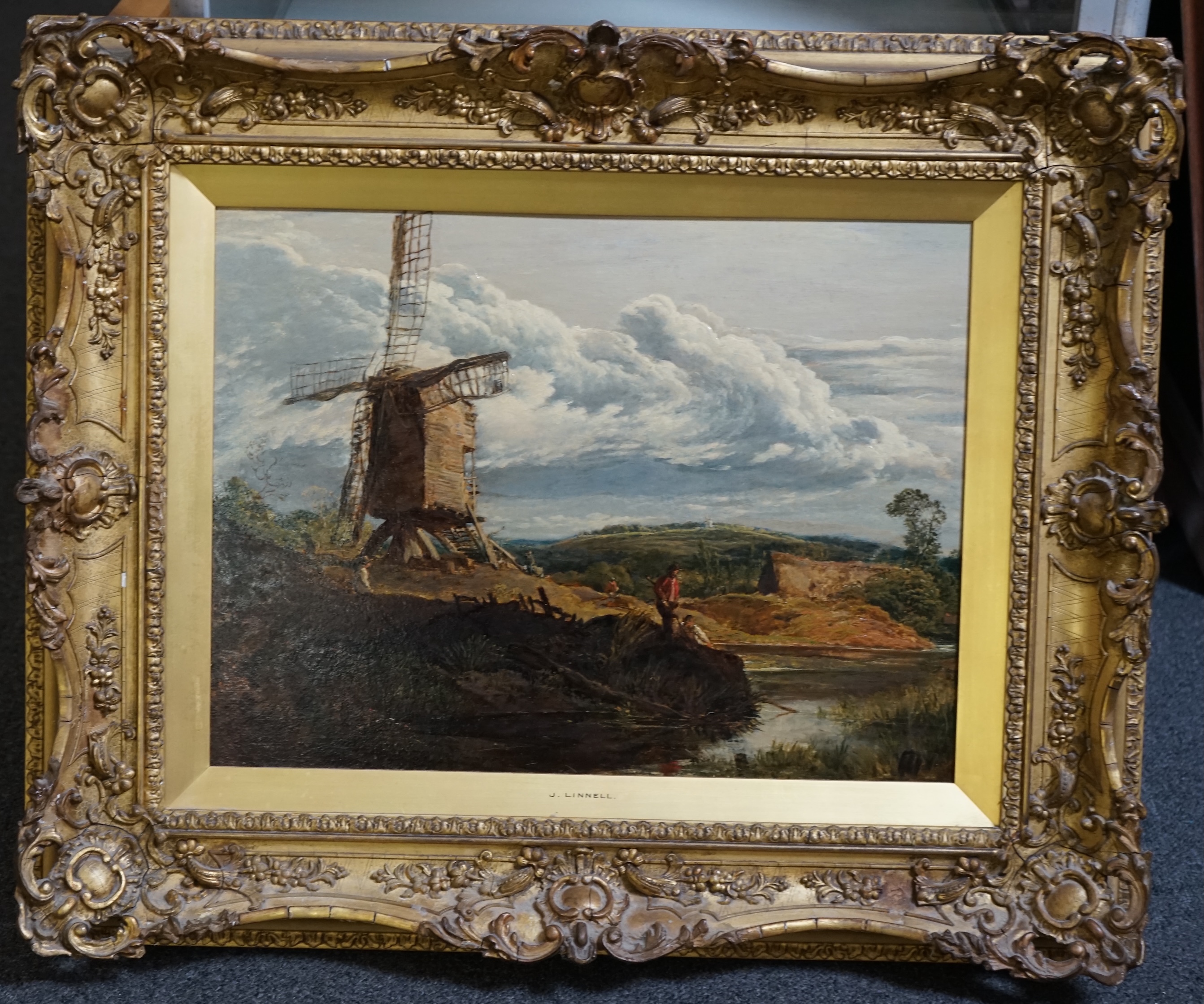 John Linnell (British, 1792-1882), Landscape with anglers and windmill, oil on panel, 35 x 46cm